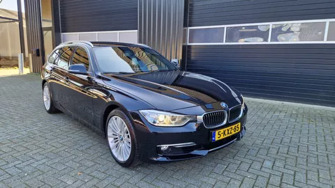 BMW 3-serie Touring 320i High Executive Xenon/Leder/Navi